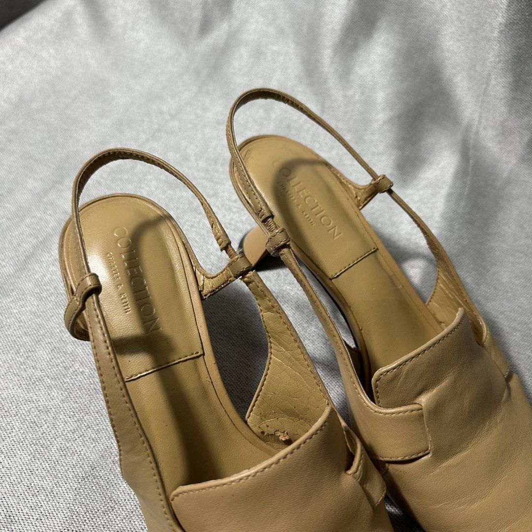 Charles & Keith Slingback Heels Beige Pointed Toe Kitten Heel (Category: Heels) located in Bayombong. Submitted by rochelle_archive_garments (Listing ID 1445577603, Image 2). Description: - Brand: Charles & Keith - Color: Beige - Style: Slingback heels - Toe: Pointed - Heel: Low kitten heel - Details: Side cut-outs, adjustable ankle strap - Condition: Minor scuffs on toe tips - Occasion: Dress up or down.