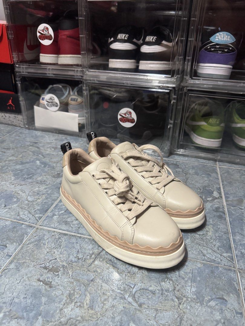 Chloe Lauren Sneakers Beige leather (Category: Sneakers & Footwear) located in Makati City. Submitted by vinsanity41546 (Listing ID 1445586910, Image 1). Description: - Beige Chloe Lauren sneakers - Signature wavy sole - Chloe logo stamped inside - Ribbon detail on the heel - Extremely comfortable and stylish - Perfect for casual outfits.
