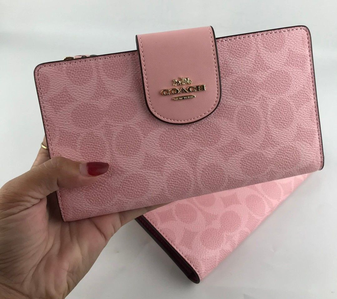 Coach wristlet bifold wallet (Category: Wallets & Card holders) located in Rizal. Submitted by shadow0101 (Listing ID 1445605574, Image 1). Description: measurement: 7 1/4" (L) x 4 1/2" (H) - same day delivery via lalamove* J&T express province - complete inclusion - actual photo posted - payment 1st policy.