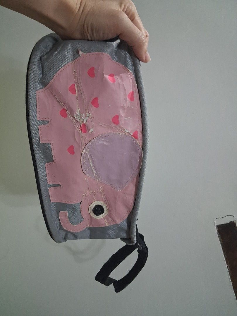 Cute Pink Elephant Pencil Case Organizer Pouch (Category: Strollers) located in Guagua. Submitted by lavieestviah (Listing ID 1445513703, Image 3). Description: - 🎀▶️Adorable grey pouch featuring a cute pink elephant design used as storage organizer in stroller. - ▶️🎀🫶Multiple interior compartments to keep pens and stationery neatly organized. -➡️▶️ with Flaws Visible not for maarte - ▶️Convenient side loop for easy carrying on the go. -▶️ Ide