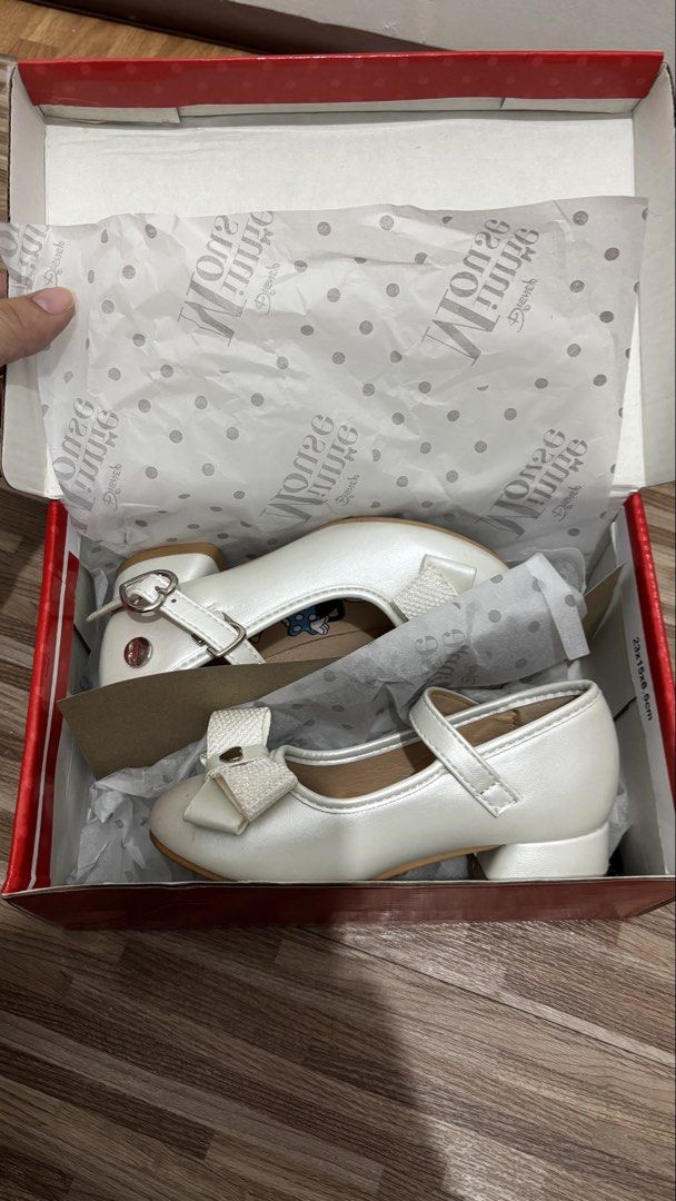 Disney Minnie Mouse White Heels/Sandals (Category: Babies & Kids Fashion) located in Antipolo. Submitted by keitoxxc (Listing ID 1445567549, Image 1). Description: Bought for ₱1299 Size 26 - can fit 15-17cm feet with allowance pa for medyas if ever My daughter used this ONCE - on her bday lang No flaws Payment first, before ship. MOP: BDO/Gcash/Maribank Shipping via Lalamove/Gogoexpress/J&T.