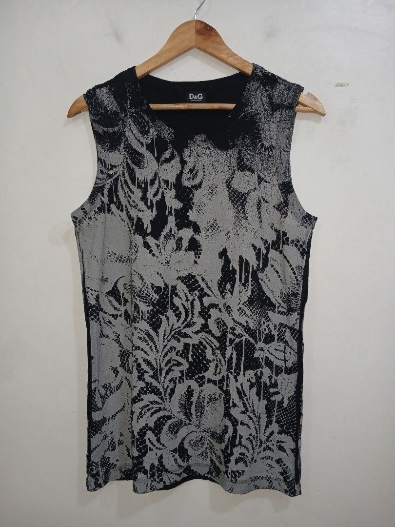 Dolce & Gabbana Tank top (Category: Luxury Apparel) located in Taytay. Submitted by leanmark103093 (Listing ID 1445540886, Image 1). Description: D0LC€ & G∆BB∆N∆ 0rig/auth Long Tank Top With Black/Gray Floral lace print With Side Seam allowance Exposed Medium on tag W18.5 L28 Good as new No issue 📩📩📩📩.