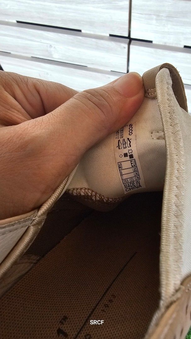 ECCO S.T.1 Lite Slip-On Sneakers (Category: Sneakers) located in Quezon City. Submitted by geminimomma2 (Listing ID 1445434304, Image 3). Description: - ECCO S.T.1 Lite slip-on sneakers - Color: Tan and beige mesh - Features elastic straps for easy wear - Known for comfort and everyday practicality - Soles show some signs of wear.