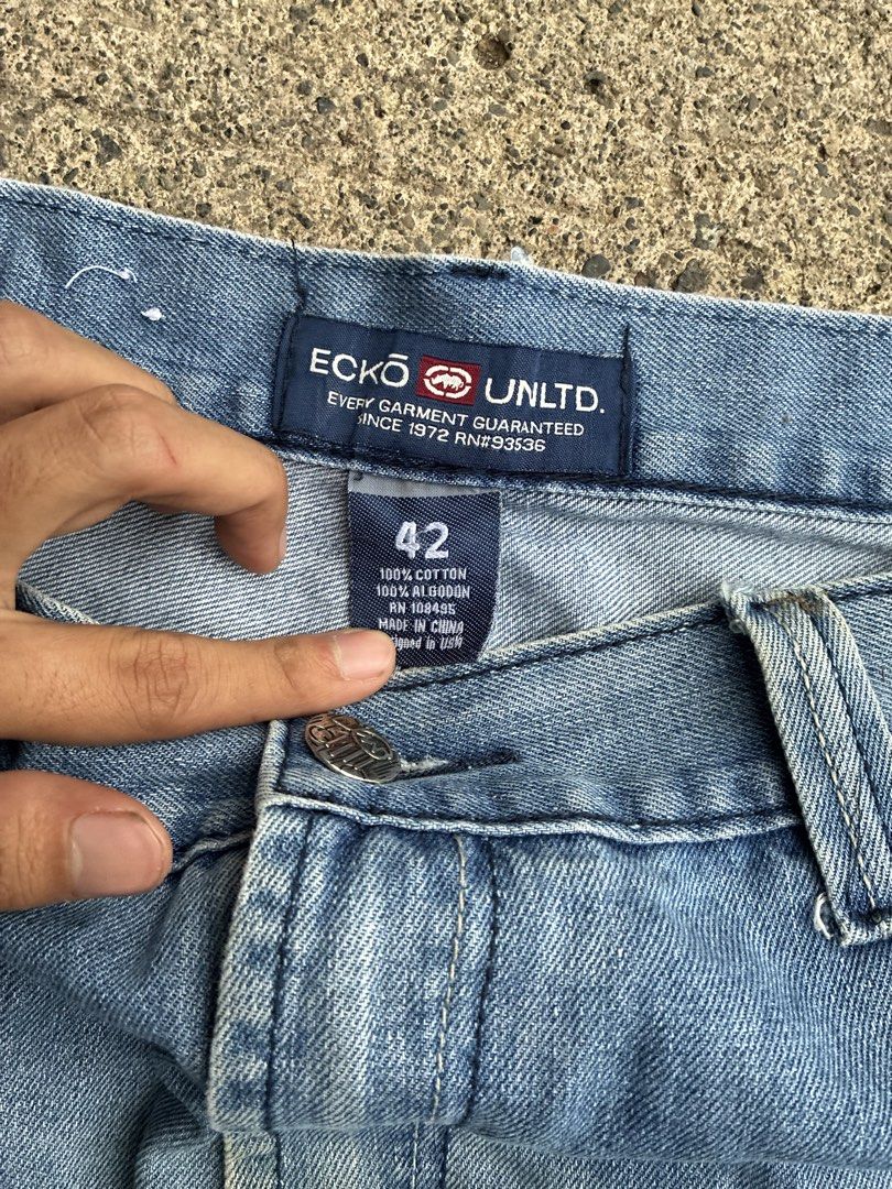 ECKO UNLTD. Baggy Light Wash Denim Size 42 (Category: Jeans) located in Davao. Submitted by trrafrma (Listing ID 1445592575, Image 3). Description: - Brand: ECKO UNLTD. - Style: Light wash denim jeans - Fit: Straight leg, classic baggy style - Size: 42 - Material: 100% Cotton - Condition: Shows natural fading and wear on knees and hems - Ideal for: Casual wear.