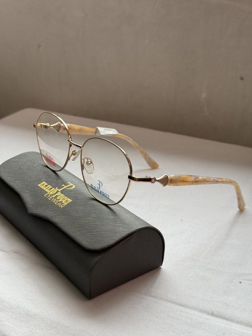 Emilio Pucci Eyewear Gold Frame Glasses Spectacle (Category: Sunglasses & Eyewear) located in Caloocan City. Submitted by lyka.07 (Listing ID 1445473951, Image 2). Description: Emilio Pucci optical frame featuring a luxurious yellow gold metal finish, designed with a sleek and elegant silhouette. A stylish designer piece that blends fashion and sophistication, perfect for everyday wear or statement styling. 📌 Fit for prescription lenses. What yo