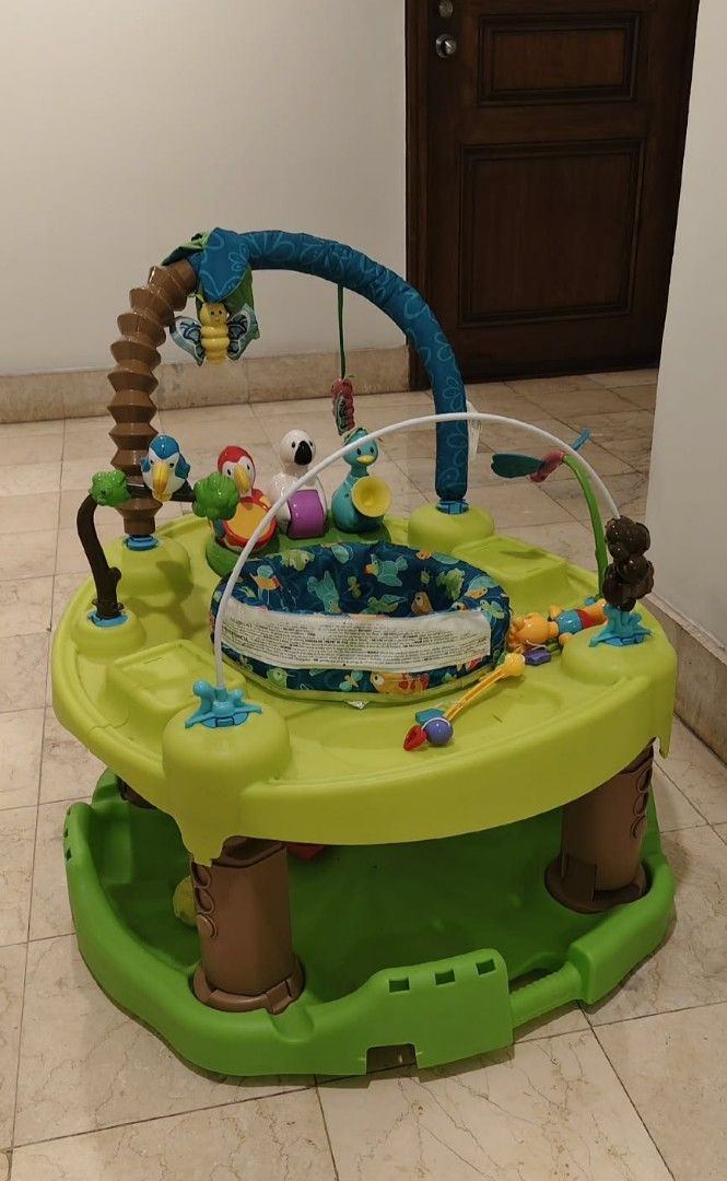 Evenflo Exersaucer Triple fun activity (Category: Infant Playtime) located in Taguig. Submitted by thrifthub.ph (Listing ID 1445511918, Image 3). Description: Used in Good condition.Need lang palitan yung Battery - Rotating seat for 360° exploration - Includes engaging toys: birds, monkey, butterflies, palm tree, and crocodile - Promotes baby's entertainment and activity - Simple to assemble and store Pick up Loc. MAKATI TUSCANY CONDO.6751 AYALA 