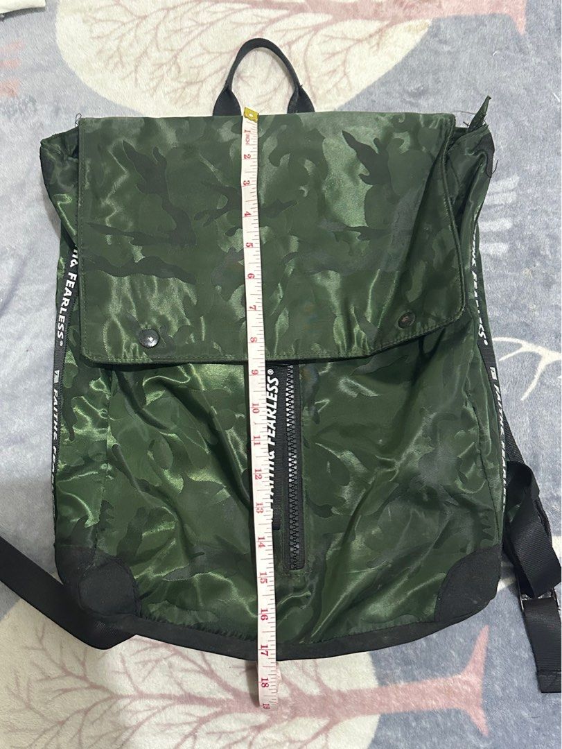 Faith & Fearless (Category: Backpacks) located in Lucena. Submitted by deklutter (Listing ID 1445565073, Image 3). Description: Faith & Fearless Camou Bag ✅waterproof ✅💯 ✅good condition ✅nego ✅ J&T.