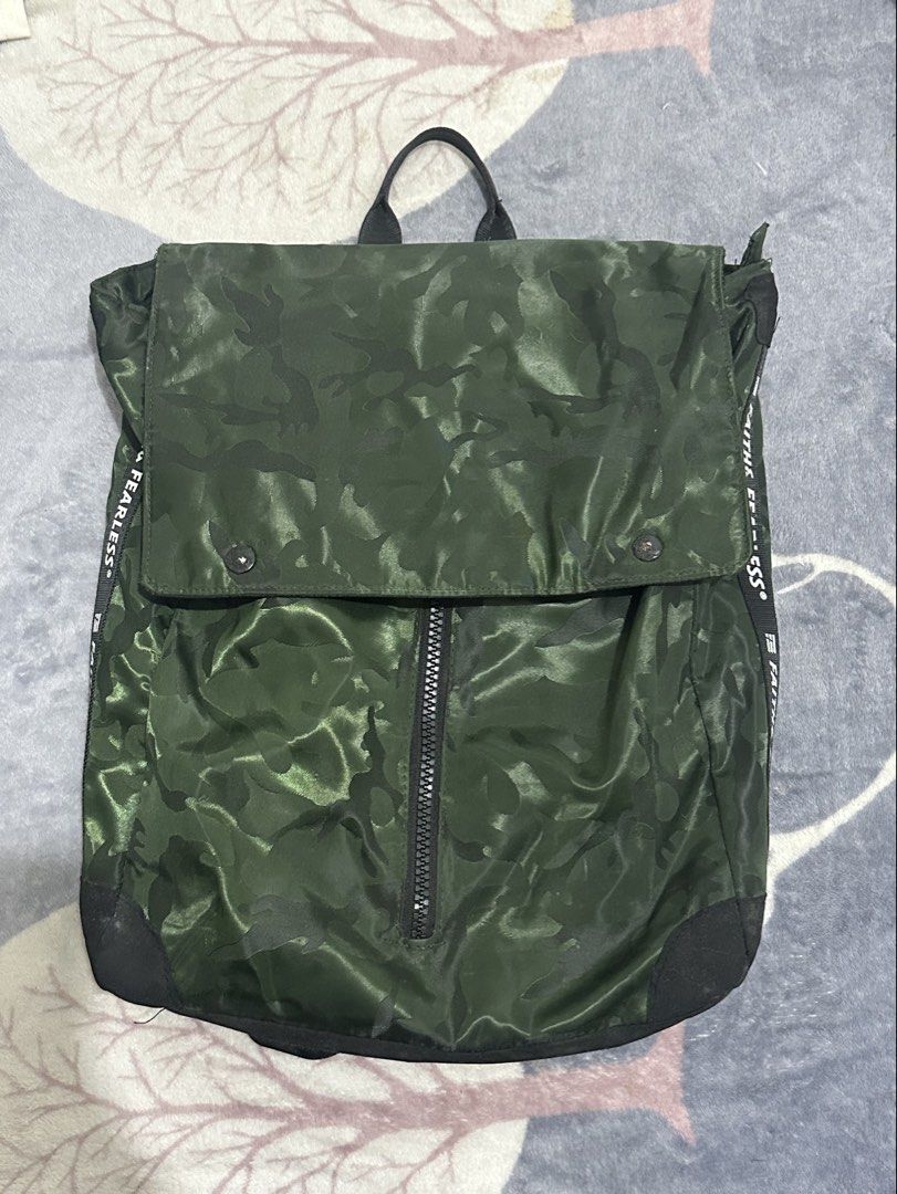 Faith & Fearless (Category: Backpacks) located in Lucena. Submitted by deklutter (Listing ID 1445565073, Image 1). Description: Faith & Fearless Camou Bag ✅waterproof ✅💯 ✅good condition ✅nego ✅ J&T.