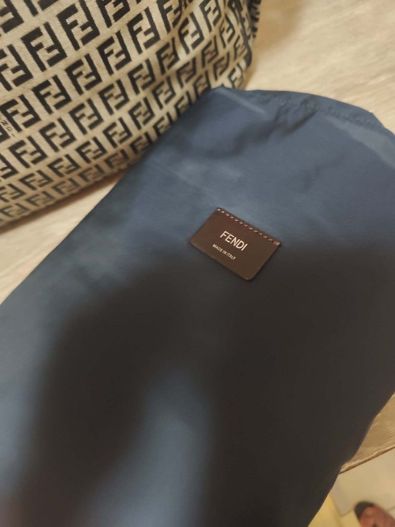 fendi diaper bag (Category: Luxury Bags & Wallets) located in Manila. Submitted by attyguiabianca (Listing ID 1445463965, Image 2). Description: - Authentic Fendi Diaper Bag - Classic Zucca Canvas Pattern - Includes Mat - Spacious Interior for Essentials -can be a weekender bag - Dark Blue Strap and Trim - Made in Italy - Ideal for Parents on the Go.