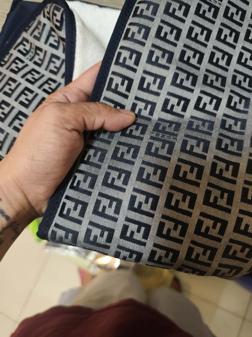 fendi diaper bag (Category: Luxury Bags & Wallets) located in Manila. Submitted by attyguiabianca (Listing ID 1445463965, Image 3). Description: - Authentic Fendi Diaper Bag - Classic Zucca Canvas Pattern - Includes Mat - Spacious Interior for Essentials -can be a weekender bag - Dark Blue Strap and Trim - Made in Italy - Ideal for Parents on the Go.