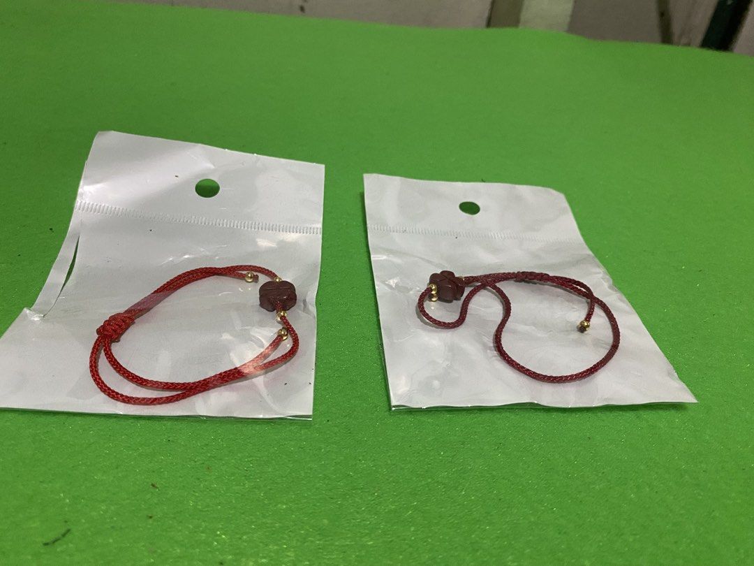 Fengshui Cinnabar Lucky Clover Red String Lucky Charm Bracelet (Category: Bracelets) located in Manila. Submitted by resi.diaz (Listing ID 1445597966, Image 1). Description: - Priced per set of 2. - Two red string bracelets included. - Each features a cute clover charm. - Accented with small gold beads. - Adjustable tie closure for a perfect fit. - Excellent for good luck or as a stylish accessory. - Ideal for gifting or personal wear. - Both bra
