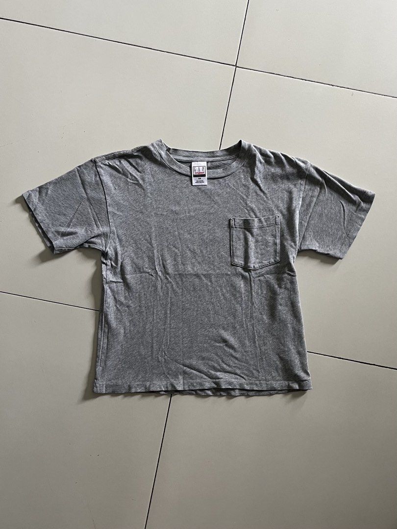 GAP Original Grey Pocket T-Shirt (Category: Tshirts & Polo Shirts ) located in Quezon City. Submitted by mbaut (Listing ID 1445505733, Image 1). Description: - Classic grey GAP pocket tee - Simple and versatile design - Ideal for everyday wear - Please check photos for condition details.