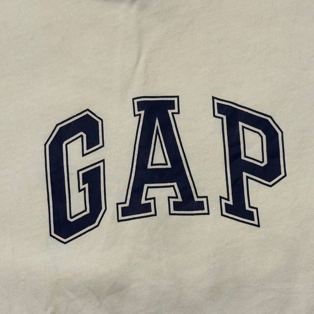Gap T-shirt Cream Navy Logo (Category: Tshirts & Polo Shirts ) located in Manila. Submitted by johnedel_james (Listing ID 1445563243, Image 2). Description: - Cream colored Gap t-shirt - Classic navy blue Gap logo on chest - 100% cotton fabric - Size: US/GB Medium - Perfect for everyday wear.