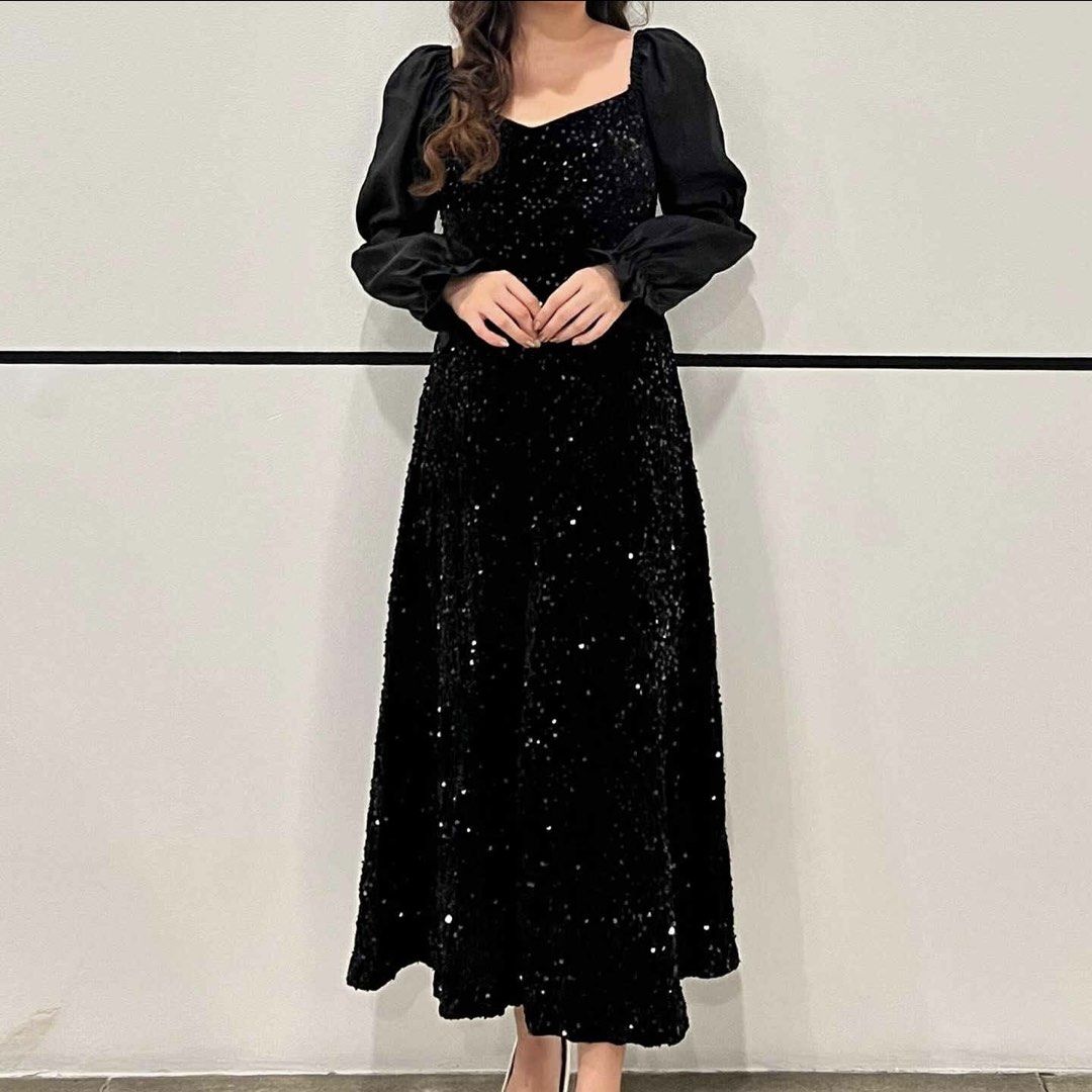 Glam Black Glitter Long Dress (Category: Evening dresses & gowns) located in Manila. Submitted by cece_est (Listing ID 1445464407, Image 1). Description: Black sequin/glitter velvet dress with balloon sleeves. Fits S-M. With zipper at the back. Super like. Used once. Pictures are when I wore it myself. shipping fee should be shouldered by the buyer.