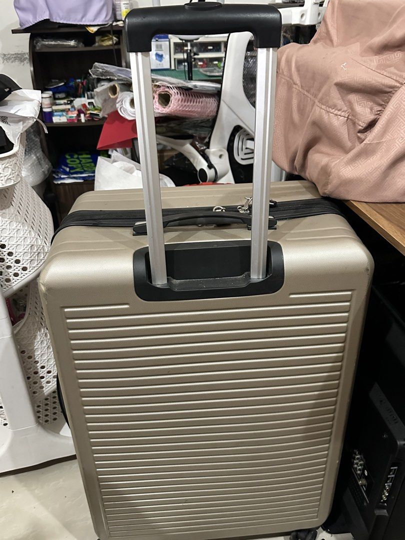 Gold Hardshell Luggage with Lock and Extendable Handle (Category: Luggage) located in Manila. Submitted by captxy (Listing ID 1445437552, Image 2). Description: - Stylish gold hardshell luggage - Secure TSA combination lock - Smooth-gliding extendable handle - Effortless 4-spinner wheel system - Minor scuffs and scratches from regular travel - Fully functional and travel-ready.