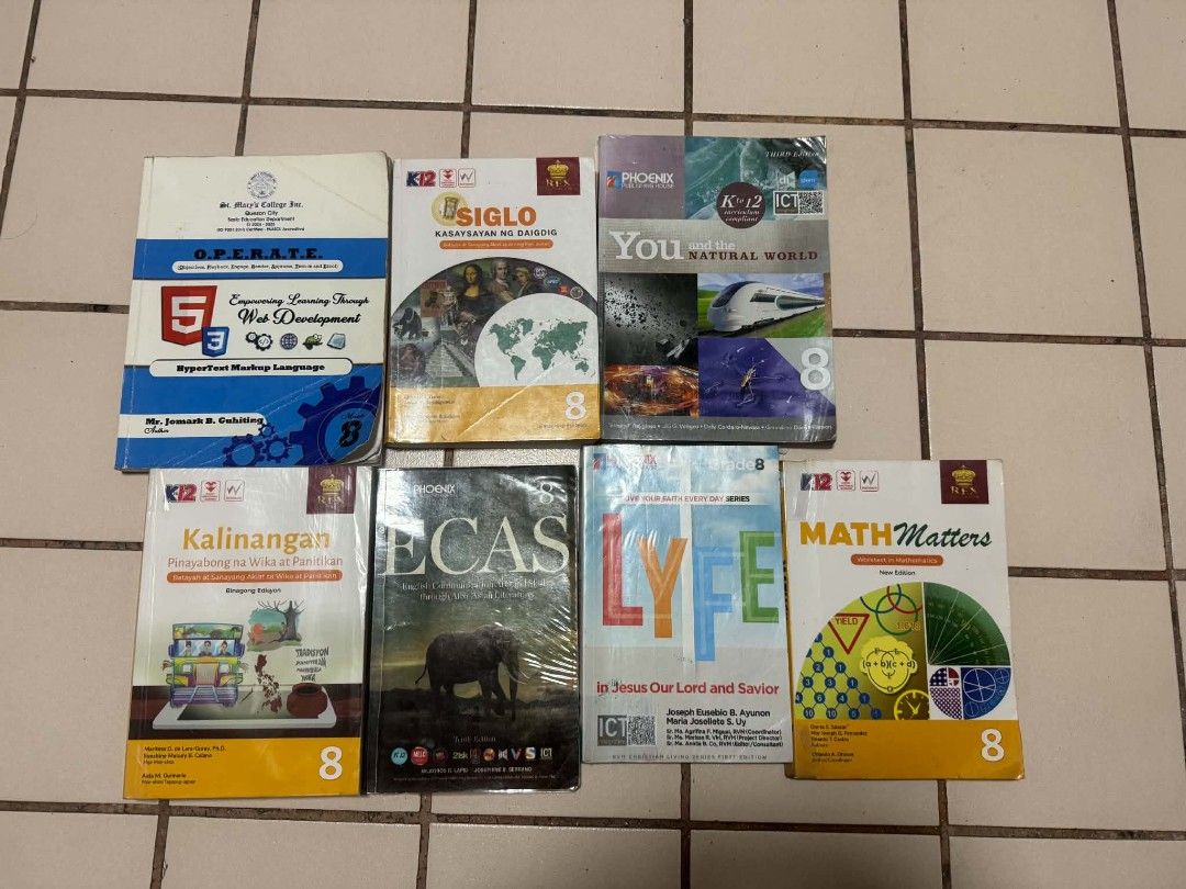 Grade 9 books (Category: Textbooks) located in Quezon City. Submitted by chervys (Listing ID 1445605257, Image 1). Description: Siglo kasaysayan ng daigdig by rex - 250 You and the natural world phoenix 3rd edition - 200 Ecas 8 10th edition by phoenix - 250 Lyfe 1st edition- 150 Kalinangan 2023 edition by rex- 250 Math matters 2023 edition by rex - 200 Empowering learning through web develoment st marys - 250 Good as new with cover Loc: cubao que