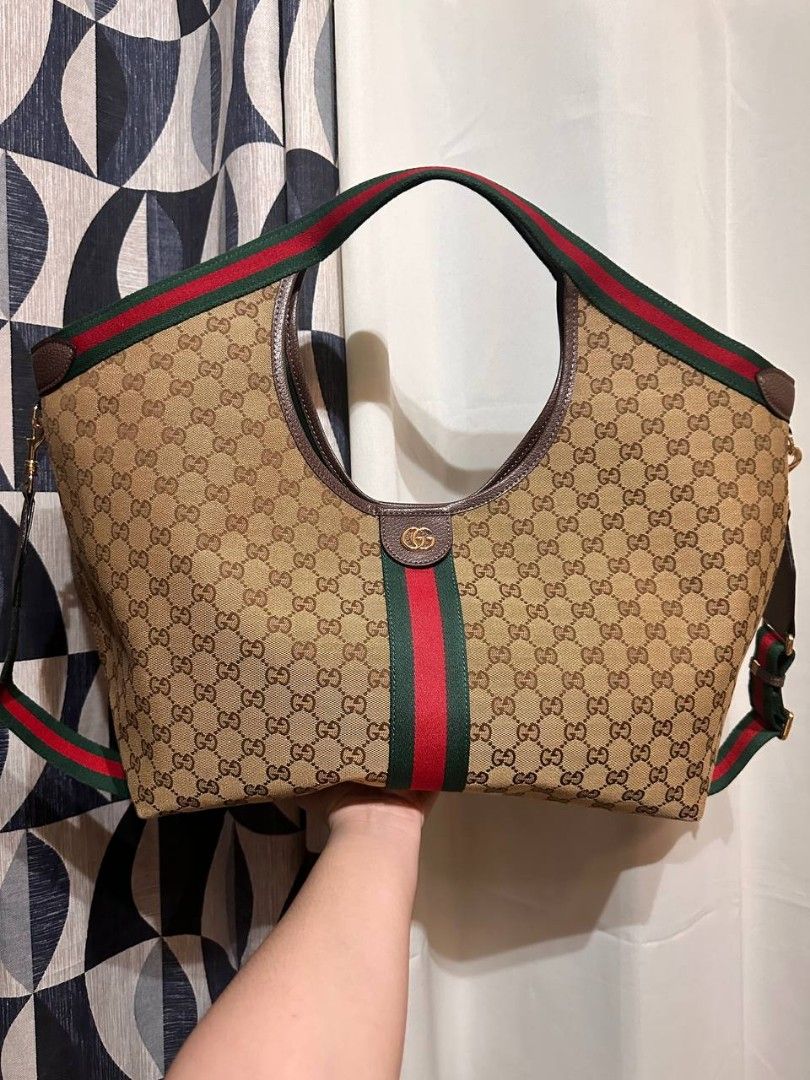 Gucci Giglio Japan Preloved (Category: Luxury Bags & Wallets) located in Manila. Submitted by tianasmom (Listing ID 1445508308, Image 1). Description: 🇯🇵 JAPAN PRELOVED 💯 CANVAS MATERIAL WITH DUSTBAG WITH CODE WITH ETIKERA WITH STRAP.