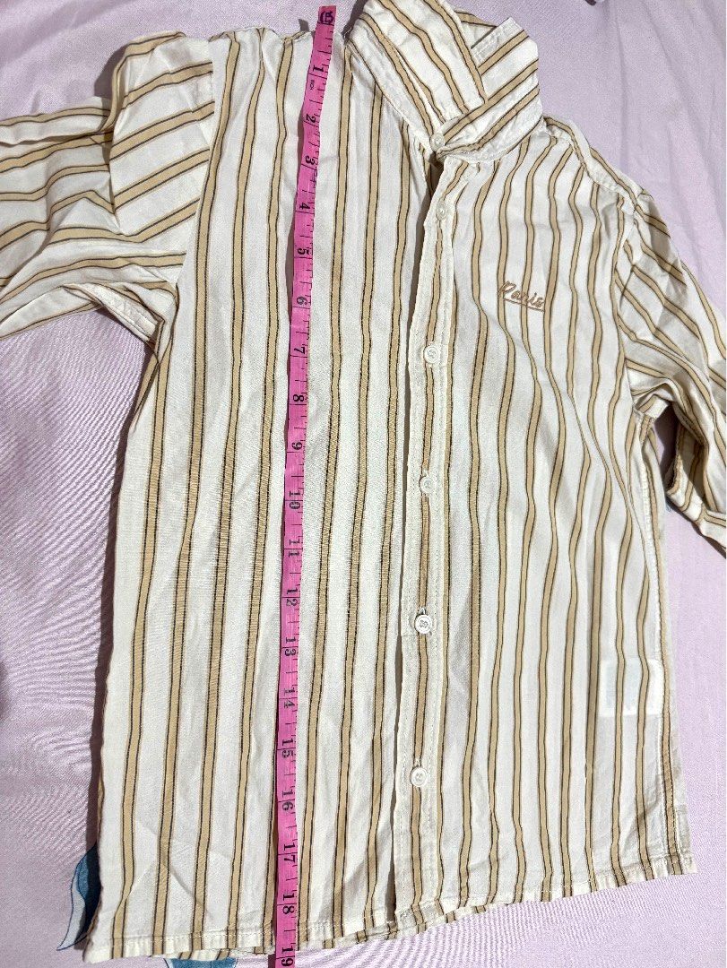 H&M Striped Long Sleeve Shirt (Category: Babies & Kids Fashion) located in Cainta. Submitted by ZPeyyy (Listing ID 1445533974, Image 2). Description: - H&M white and tan striped long sleeve shirt - Small embroidered detail on the chest - Button-up front closure - Perfect for casual wear or smart casual outfits - Please check photos for detailed measurements.
