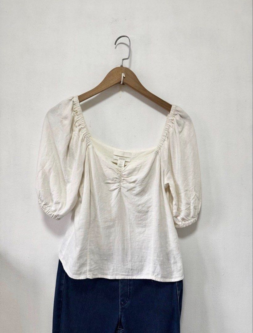 H&M White Linen Puff Sleeves Blouse Top (Category: Blouses) located in Cavite. Submitted by casingpavements (Listing ID 1445514952, Image 1). Description: Can fit medium to large Stretchable Sleeves.