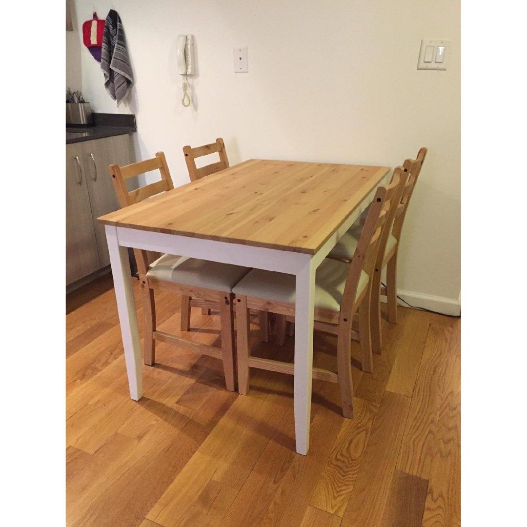 IKEA lerhamn solid pine Dining Table (Category: Tables & Sets) located in Singapore. Submitted by jasonneedstoclearhisroom (Listing ID 1445604527, Image 1). Description: - Wooden dining table with white frame - Table dimensions: 118cm (L) x 74cm (W) x 75cm (H) - Ideal for compact dining areas or kitchens.