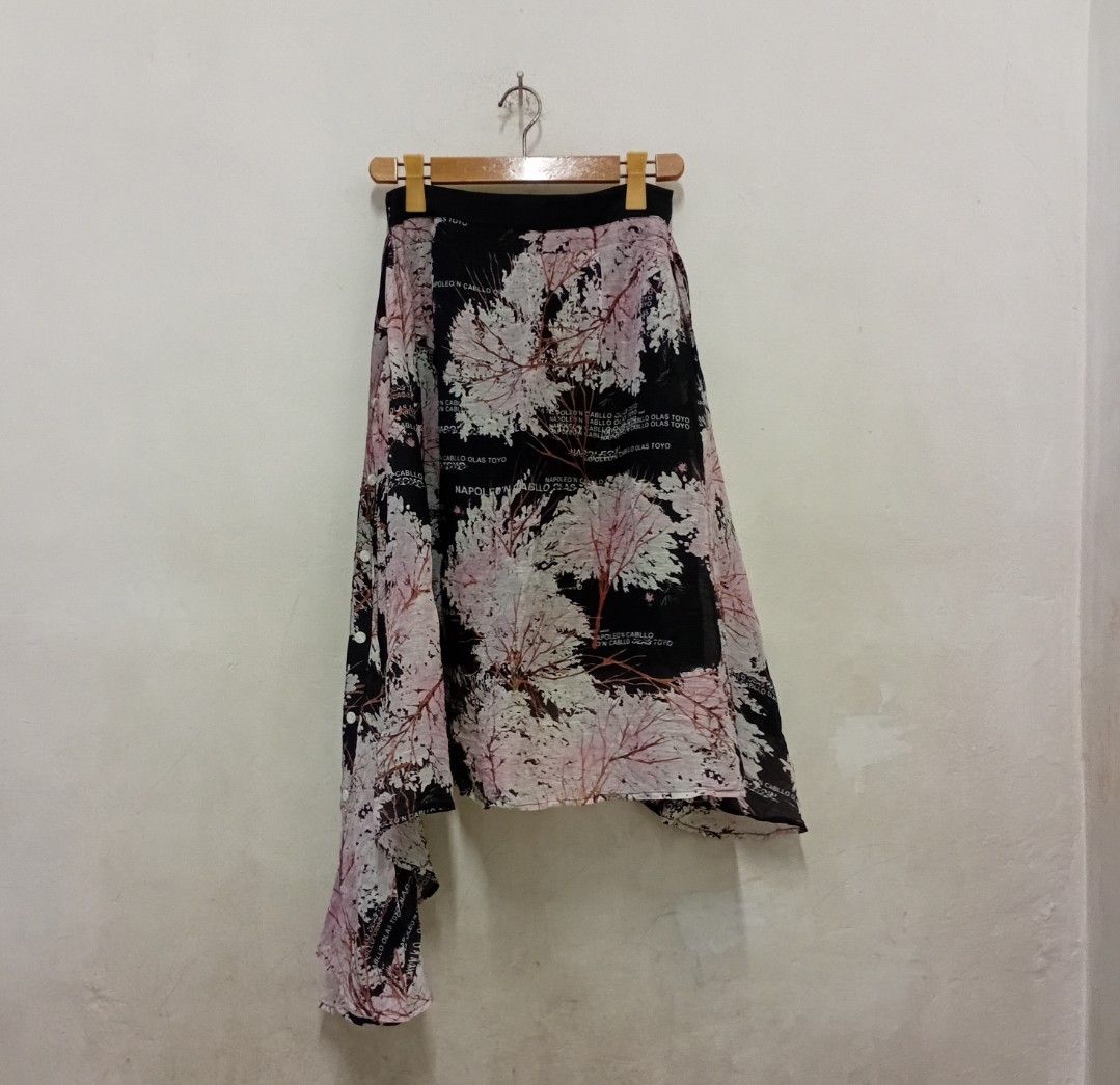 INITIAL ASYMMETRICAL Black Skirt (Category: Luxury Apparel) located in Manila. Submitted by eriiicaspage (Listing ID 1419119805, Image 3). Description: PREOWNED LIKENEW Authentic INITIAL ASYMMETRICAL HEMLINE BLACK SKIRT Size M-L Width 14.5 '-15"X Length 28' - Unique asymmetrical hemline - Delicate pink and white floral pattern - Comfortable waist -Side Zipper Closure No flaws Excellent Condition Bought in Japan 9.7/10.