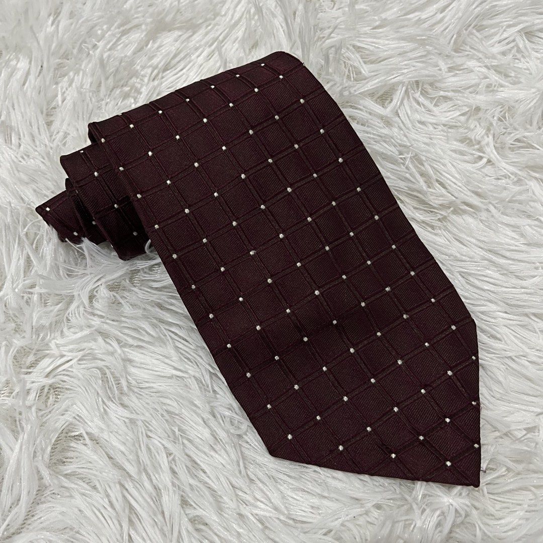 Joseph & Feiss International Silk Tie - Burgundy Grid Pattern (Category: Ties) located in Cuyapo. Submitted by Ashtyn.Pre.Loved (Listing ID 1445562960, Image 1). Description: - Classic burgundy tie - Subtle white grid pattern - Made of 100% silk - Elevates any outfit - Ideal for formal and business wear.