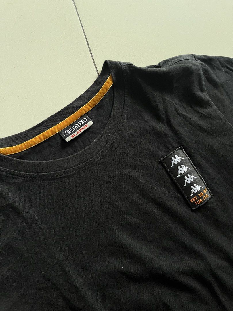 Kappa Black T-Shirt XL (Category: Tshirts & Polo Shirts ) located in Quezon City. Submitted by mbaut (Listing ID 1445505231, Image 2). Description: - Black Kappa T-shirt - Size XL - fits smaller - Kappa logo prominently displayed on chest and back - '67' graphic detail on the sleeve - Perfect for everyday casual wear.