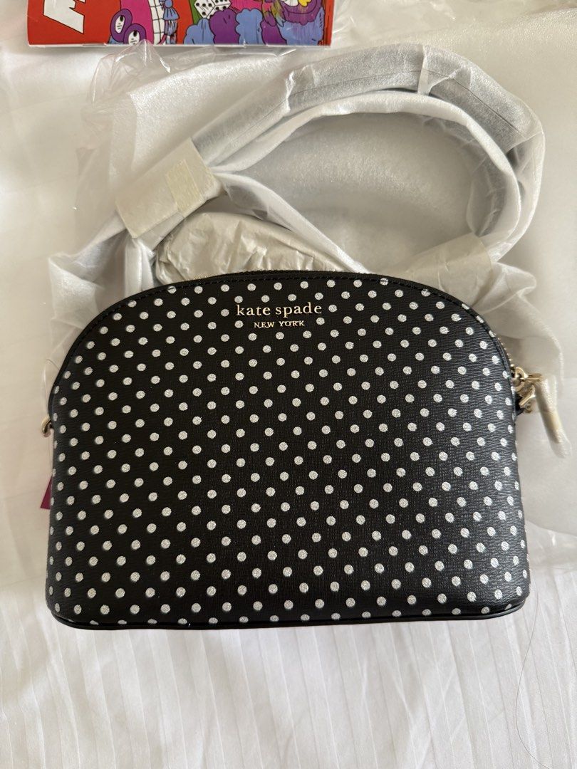 Kate Spade Mixed Crossbody set (Category: Luxury Bags & Wallets) located in Manila. Submitted by luckydragon_6bb637 (Listing ID 1445473892, Image 1). Description: Brand new Authentic Kate Spade 3 in 1 printed pvc and saffiano leather spade flower jacquard and faille lining small dome crossbody: 5”h x 7”w x 2”d small dome cosmetic case: 4”h x 7”w x 2”d cardholder: 3”h x 3”w small dome crossbody with zipper closure, adjustable shoulder strap small 