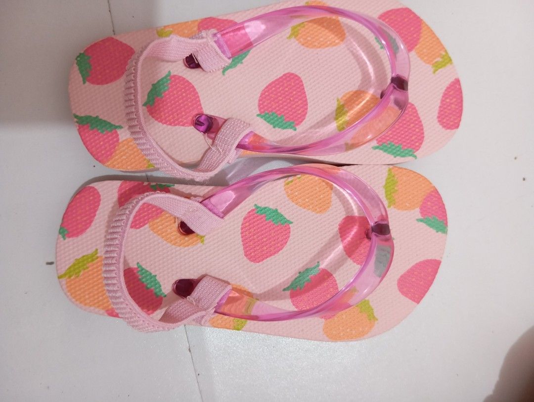 Kids Pink Strawberry Flip-flops with Strap (Category: Babies & Kids Fashion) located in Manila. Submitted by brion123 (Listing ID 1445560863, Image 1). Description: - size 15 Adorable pink flip-flops for kids - Fun all-over strawberry print - Clear straps with secure pink elastic back strap - Easy slip-on design - Ideal for beach, pool, or everyday wear.