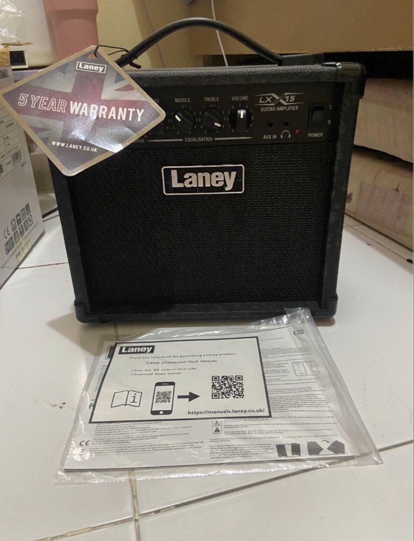 Laney LX15 Guitar Amplifier (Category: Soundbars, Speakers & Amplifiers) located in Cebu City. Submitted by kjzru (Listing ID 1445475148, Image 2). Description: Key Features & Specifications Power: 15 Watts RMS Speakers: 2 x 5” Custom Drivers Channels: 2 (Clean and Drive) EQ: 3-Band (Bass, Middle, Treble) + Bright SwitchControls: Gain, Master Volume, Drive Switch, EQ Inputs: 1/4” Guitar Input, 3.5mm Stereo Aux-In Outputs: 3.5mm Stereo Headphone S