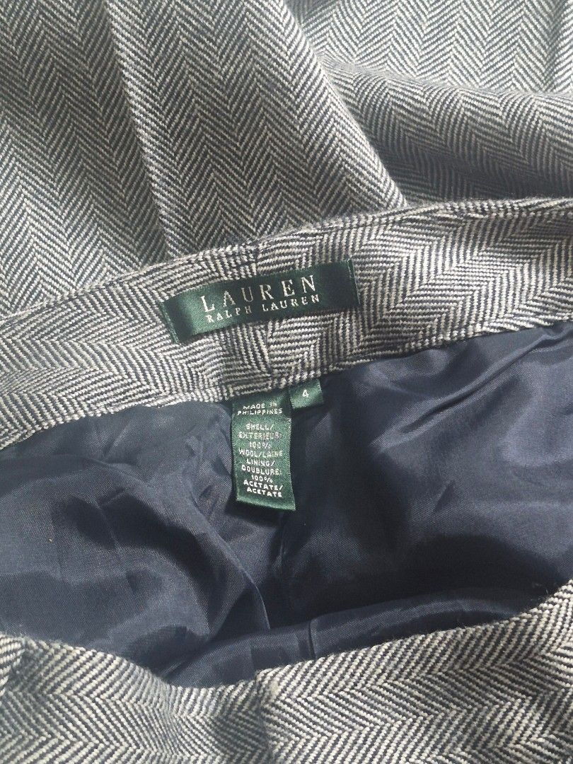 Lauren Ralph Lauren Herringbone Flared Trousers (Category: Other Bottoms) located in Bulacan. Submitted by vince4593 (Listing ID 1445431440, Image 3). Description: - Lauren Ralph Lauren trousers - Classic dark grey herringbone pattern - Flared leg style - Front button and zip closure - Fully lined interior - Ideal for smart casual outfits - Please check photos for condition details.