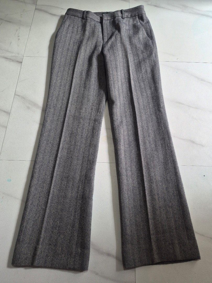 Lauren Ralph Lauren Herringbone Flared Trousers (Category: Other Bottoms) located in Bulacan. Submitted by vince4593 (Listing ID 1445431440, Image 1). Description: - Lauren Ralph Lauren trousers - Classic dark grey herringbone pattern - Flared leg style - Front button and zip closure - Fully lined interior - Ideal for smart casual outfits - Please check photos for condition details.