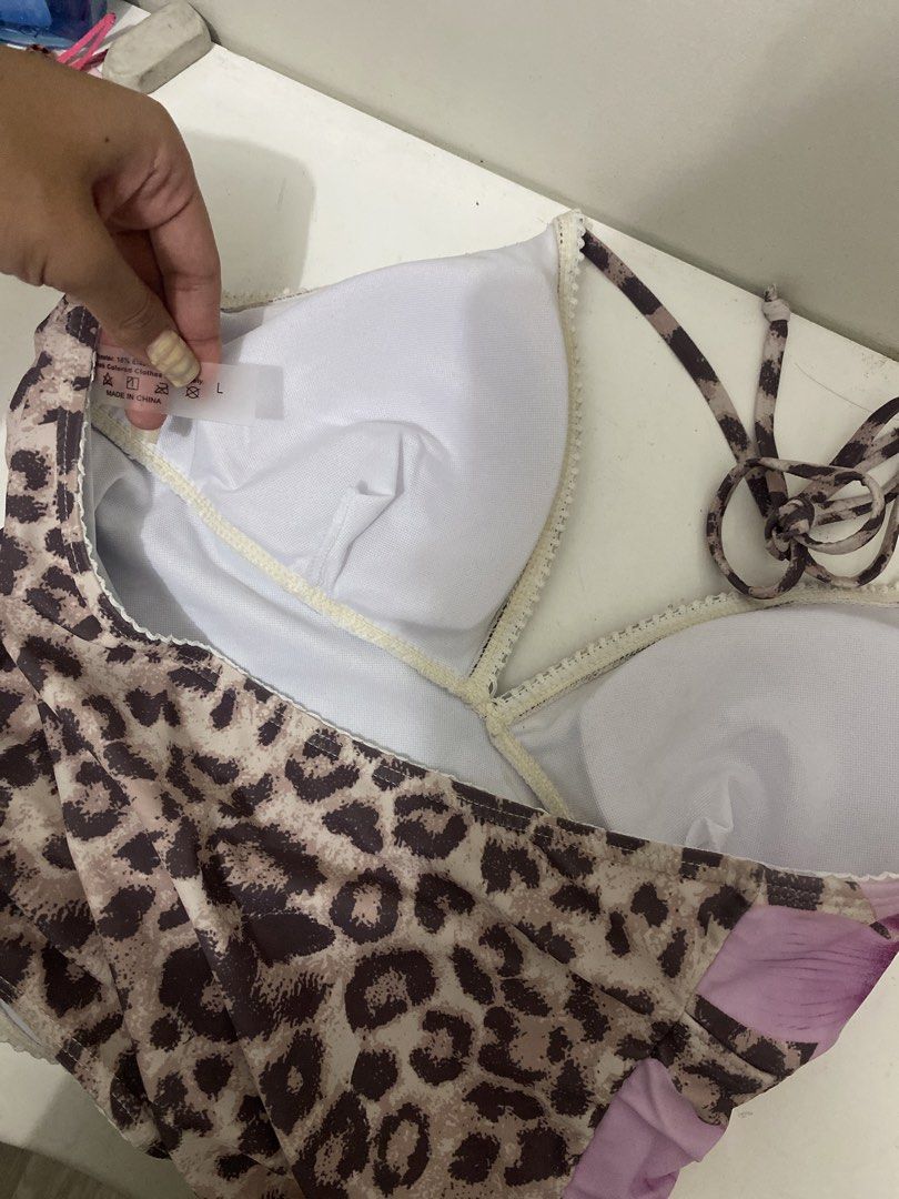 Tankini Leopard Print & Orchid Halter Bikini Set (Category: Bikinis & Swimsuits) located in San Juan City. Submitted by helpabaddietodecclutter (Listing ID 1445578987, Image 3). Description: - Cute bikini set - Leopard print with orchid design - Halter neck top with tie closure - Matching tie-side bottoms - Size: L - Ideal for beach or pool.