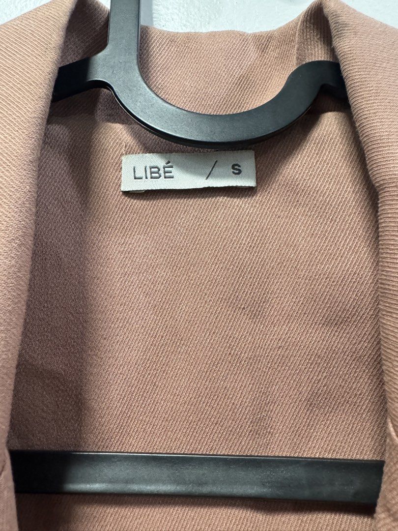 LIBÉ Pink Drawstring Waist Blazer Size S (Category: Coats, Jackets and Outerwear) located in Butuan. Submitted by lexalisting (Listing ID 1445524370, Image 2). Description: - Cute pink blazer from LIBÉ - Features a drawstring waist for a cinched, flattering look - Two buttons at the front closure - Four buttons on each cuff - Perfect for dressing up or down - Easy to style for work or casual outings.