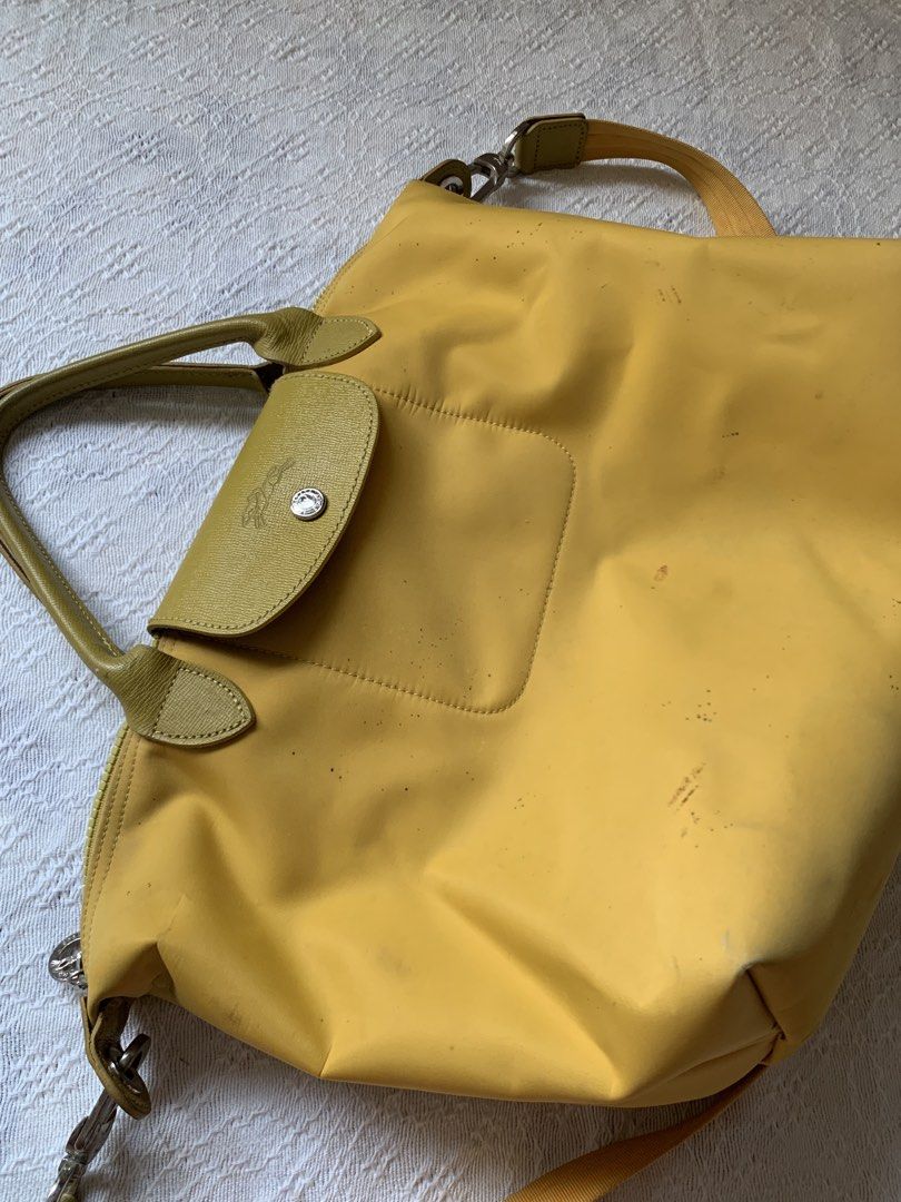 Longchamp Le Pliage Neo Yellow Bag (Category: Luxury Bags & Wallets) located in Batac City. Submitted by mateii (Listing ID 1445590208, Image 3). Description: Longchamp Le Pliage Tote Bag Yellow 📌 Color: Yellow 📌 Dimensions: 16 inches (W) x 11 inches (H) 📌 Condition: Good 📌 Issue: Has stains on the body part 📌 Reason for Selling: Decluttering, Not in use 📌 Shipping: J&T 📌 Mode of Payment: Gcash or Maribank 💰 Negotiable.