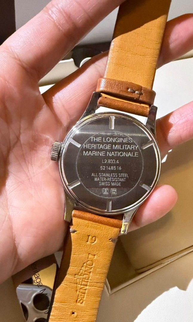 Longines Military Marine Nationale (Category: Luxury Watches) located in Paranaque City. Submitted by josefguillen (Listing ID 1445525572, Image 2). Description: Brand: Longines Model: Heritage Military Marine Nationale Reference Number: L2.833.4.93.2 Brand: Longines Model: Heritage Military Marine Nationale Reference Number: L2.833.4.93.2 Diameter: 38.5mm Case Material: Steel Lug width: 19mm Dial Color: Beige Indexes: Painted, Arabic Lume: Super