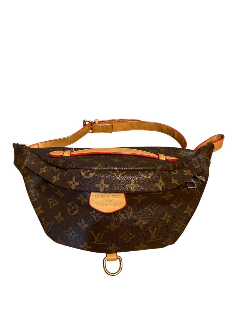 Louis Vuitton Monogram Canvas Bumbag (Category: Luxury Bags & Wallets) located in Cagayan de Oro. Submitted by timeless.ph (Listing ID 1445570355, Image 1). Description: Condition: RANK AB Model: Bumbag (M43644)Material: Monogram coated canvas with vachetta (natural cowhide) leather trimHardware: Gold-tone brass📏 SpecificationsMain Features: Zippered closure, top handle, adjustable belt strap, front D-ringInterior Lining: Cotton canvasWear Style