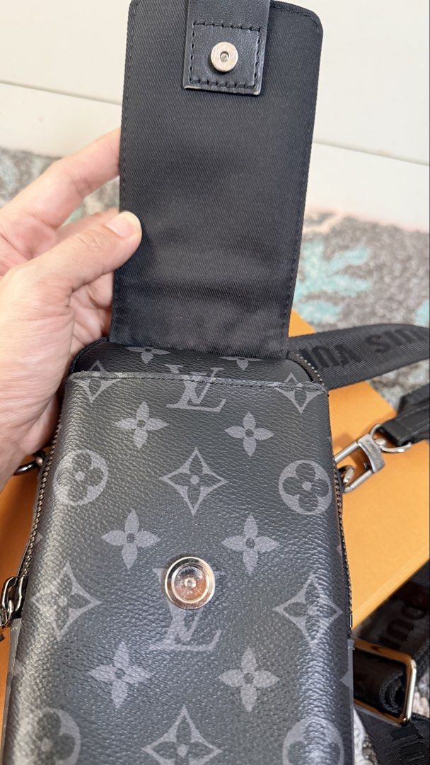Louis Vuitton Monogram Eclipse Crossbody Bag (Category: Luxury Bags & Wallets) located in Las Pinas. Submitted by lanasmom (Listing ID 1445482717, Image 3). Description: - Authentic Louis Vuitton crossbody bag - Monogram Eclipse canvas in black and grey - Features a main zippered compartment - Front flap pocket with secure snap closure - Adjustable strap for comfortable wear - Comes with original box and paperbag - Ideal for everyday use - Authen