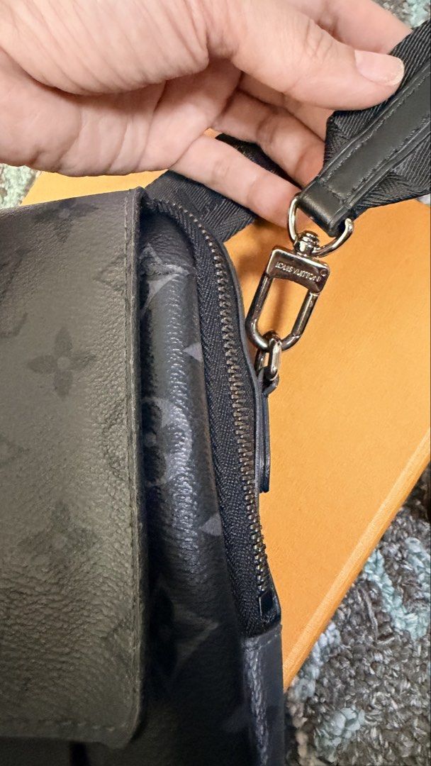 Louis Vuitton Monogram Eclipse Crossbody Bag (Category: Luxury Bags & Wallets) located in Las Pinas. Submitted by lanasmom (Listing ID 1445482717, Image 2). Description: - Authentic Louis Vuitton crossbody bag - Monogram Eclipse canvas in black and grey - Features a main zippered compartment - Front flap pocket with secure snap closure - Adjustable strap for comfortable wear - Comes with original box and paperbag - Ideal for everyday use - Authen