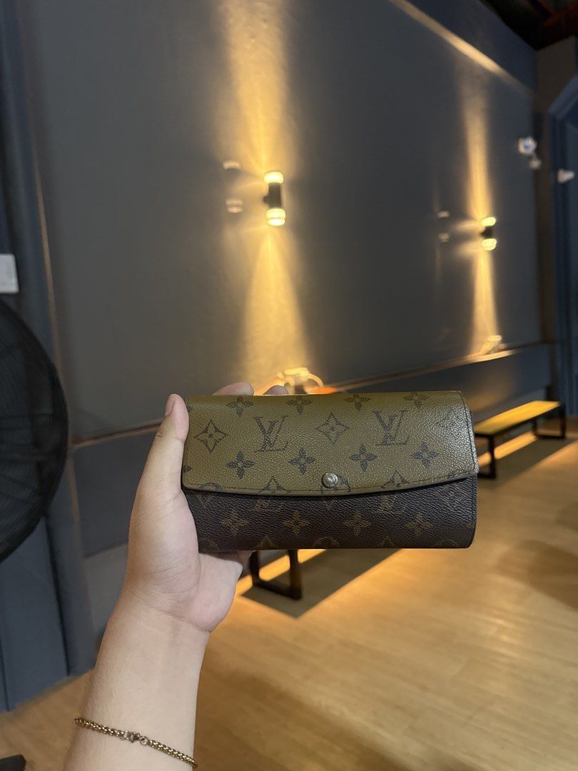 Louis Vuitton Monogram Wallet (Category: Luxury Bags & Wallets) located in Calamba. Submitted by leeadriannn796 (Listing ID 1445521043, Image 1). Description: - Classic Louis Vuitton wallet - Iconic monogram pattern - Brown and tan colorway - Fold-over design with snap closure - Plenty of space for cards and cash - Timeless piece for everyday use.