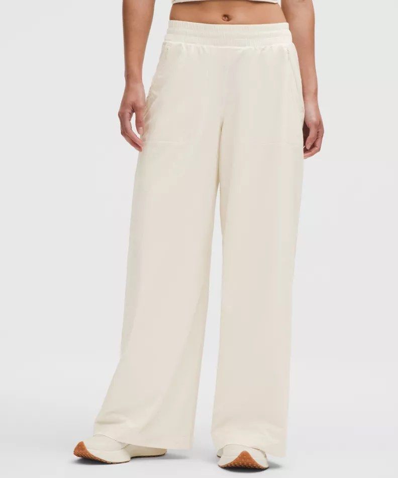 Lululemon Swift Wide Leg Mid-Rise Pants (Category: Other Bottoms) located in Pasig City. Submitted by perl2018 (Listing ID 1445595672, Image 2). Description: - Lululemon cream wide leg pants - Soft Align fabric - Mid-rise fit - Elastic waistband - Side pockets with zippers - Super comfy and flowy - Ideal for lounging or casual wear US6 Very flattering! With lining, not see through RFS Wrong size 😭😭😭😭 I really like this pants Mop Gcash UB BPI.