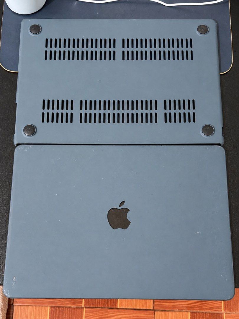 2pc MacBook Air 15" Hard Case (Category: Laptop Bags & Sleeves) located in Tanza. Submitted by angelicaagb (Listing ID 1445554653, Image 1). Description: Used with signs of use. May have light scratches, scuffs, and dirt marks, but still fully functional and provides good protection for your MacBook. .