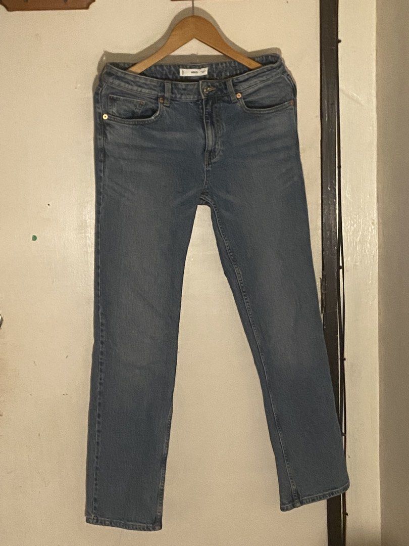 Mango Blue Denim Straight Leg Jeans (Category: Jeans) located in Mandaluyong City. Submitted by matcha.decluttz (Listing ID 1445539048, Image 1). Description: - Brand: Mango - Color: Classic Blue Denim - Fit: Straight Leg - Closure: Button and Zip - Pockets: Front and Back - Style: Versatile staple piece, easy to dress up or down.