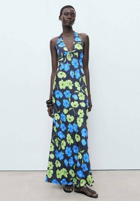Mango Floral Halter Neck Maxi Dress (Category: Dresses) located in Quezon City. Submitted by bagelll18 (Listing ID 1445431178, Image 1). Description: For rent: Php 1000 for 4 days + Security Deposit Php 1000 (Refundable) - Long floral halter neck dress - Ties at the front - Blue and green flowers on a dark background - Ideal for summer occasions or beach vacations - Comfortable and flowy material.