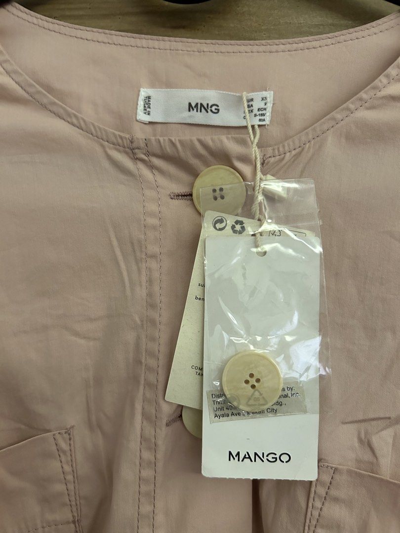 Mango Pink Button-Up Midi Dress with Belt (Category: Dresses) located in Quezon City. Submitted by zen_mollygirl (Listing ID 1445489659, Image 3). Description: - Pink midi dress from Mango - Button-up front - Includes a matching belt - Three-quarter sleeves - Chest pockets - Versatile for casual or dressy wear - Comfortable and stylish.