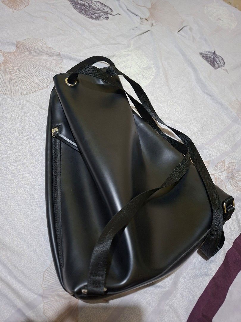 Max Mara Black Drawstring Bucket Bag Backpack (Category: Backpacks) located in Taguig. Submitted by dafashionph (Listing ID 1445569389, Image 3). Description: Authentic Max Mara Drawstring Bucket Bag / Backpack 🖤 Selling this sleek, minimalist Max Mara bag. Super versatile piece that works perfectly as a daily casual backpack or a trendy drawstring bucket bag! ✨ FEATURES: • Brand: Max Mara (Authentic VIP Gift with Purchase / Parfums line) • Colo