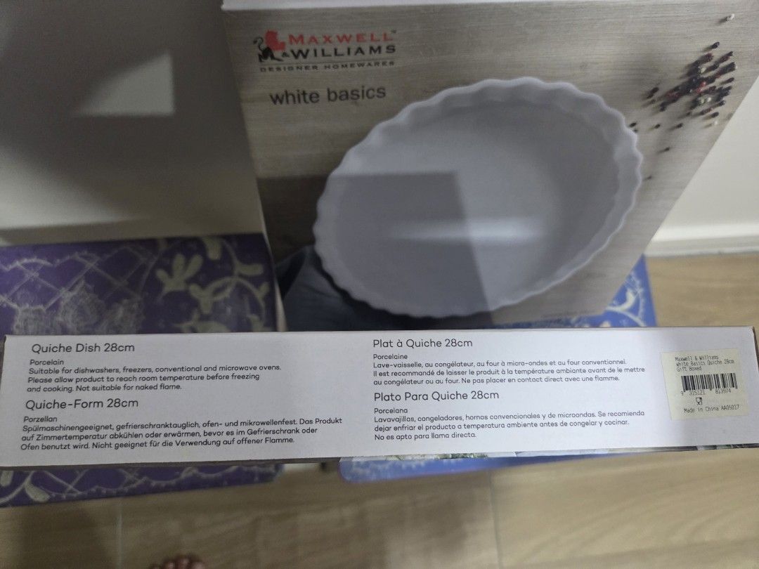 Maxwell Williams White Basics Quiche Dish 28cm (Category: Dinnerware & Cutlery) located in Petaling Jaya. Submitted by jumbomumbo (Listing ID 1445530037, Image 2). Description: - Maxwell Williams White Basics Quiche Dish - Size: 28cm - Material: Porcelain - Versatile Use: Suitable for dishwashers, freezers, conventional ovens, and microwaves. - Important Note: Allow dish to reach room temperature before placing in the freezer..