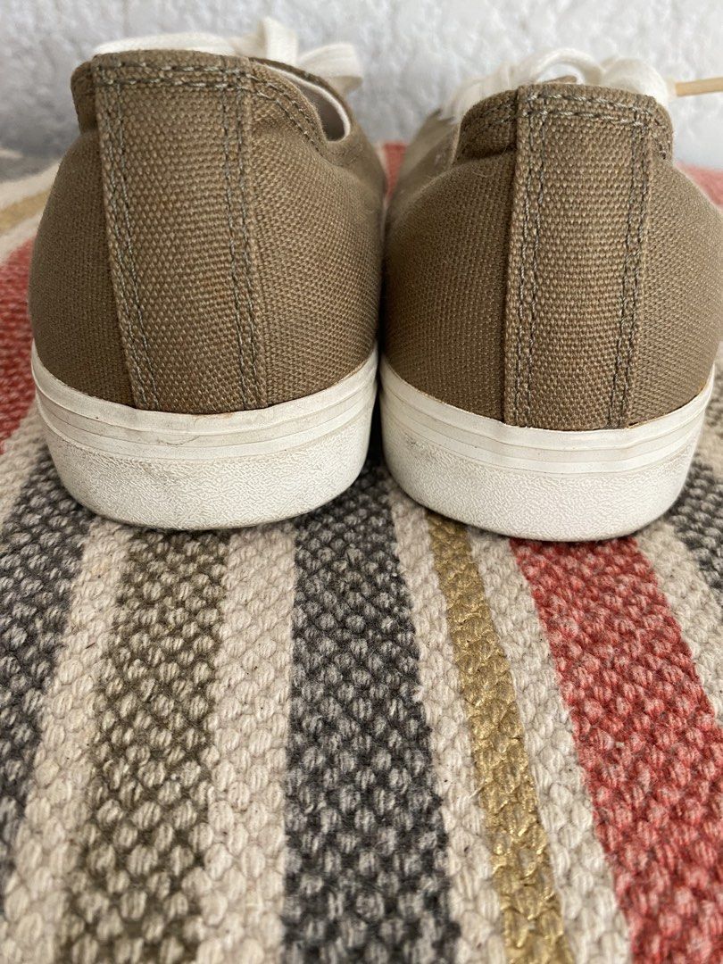MUJI Canvas Sneakers Olive Green (Category: Sneakers) located in Paranaque City. Submitted by dessells_ (Listing ID 1445479155, Image 3). Description: - MUJI Canvas Sneakers (unisex) - Color: Olive Green - Style: Lace-up with rubber toe cap - Size: US 7.5 women: US 6 men ( indicated on its tag) - used a few times only - condition: needs cleaning - Gcash, J&T - P550 .