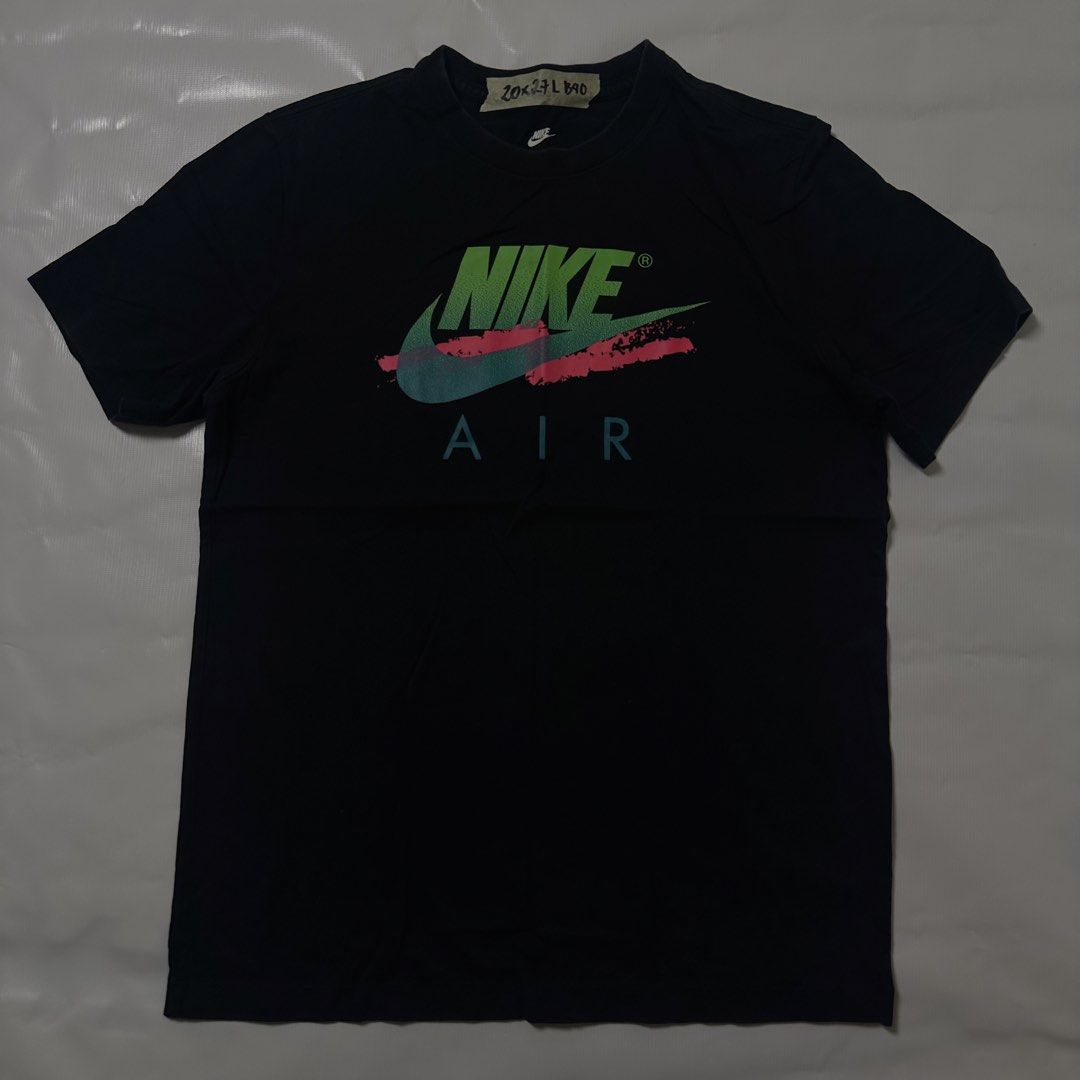 Nike Air T-Shirt Size L (Category: Tshirts & Polo Shirts ) located in Manila. Submitted by johnedel_james (Listing ID 1445563966, Image 1). Description: - Black Nike Air T-shirt - Size: Large (L) - Material: 100% Cotton - Features a cool graphic print with Nike Air branding on the front - Ideal for casual wear - Please check photos for detailed condition.