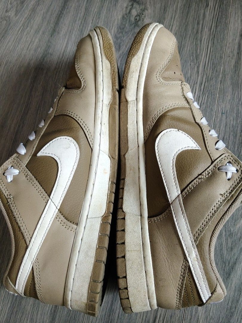 Nike Dunk Low Retro Sneakers Size 9 (Category: Sneakers) located in Valenzuela. Submitted by daniel18980 (Listing ID 1445493519, Image 3). Description: - Nike Dunk Low Retro - Colorway: khaki/white- hazel rush - Size: 9 (US Men's) - Condition: Used, with visible signs of wear on soles and uppers - Includes: Original box - A timeless classic for any sneaker collection.